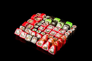 large set of rolls of fish and vegetables. Japanese food