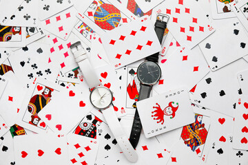 Wrist watches on playing cards