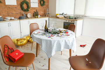 Interior of messy room after New Year party celebration