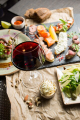 Red dry wine with appetizers. Georgian restaurant.