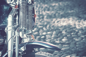 suspensions of moto, detail of moto with copy space (background image blue tone effect)
