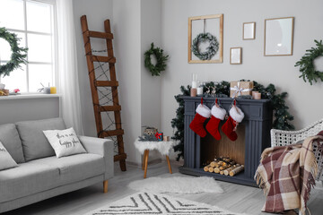 Decorated fireplace in interior of room on Christmas eve