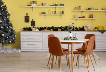 Interior of modern kitchen decorated for Christmas