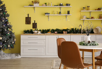 Interior of modern kitchen decorated for Christmas