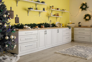 Interior of modern kitchen decorated for Christmas