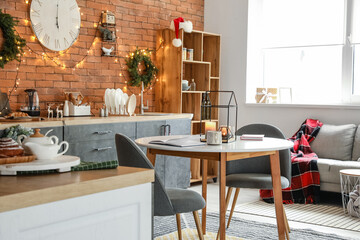 Interior of modern kitchen decorated for Christmas