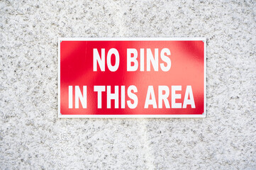 No bins allowed in this area red sign