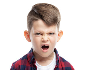 Angry boy of 7 years without a front tooth. Close-up. Isolated on white background.