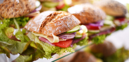 Ham and cheese sandwiches displayed for sale