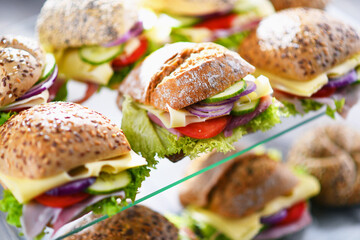 Ham and cheese sandwiches displayed for sale