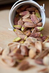 handful of whole and peeled pistachios