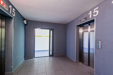 Russia, Moscow- April 17, 2020: interior public place, house entrance. doors, walls, staircase corridors