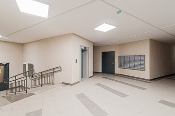 Russia, Moscow- April 17, 2020: interior public place, house entrance. doors, walls, staircase corridors