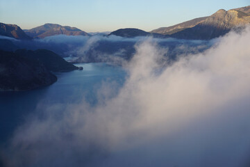 fog over the lake of Serre Ponçon, France in the early morning