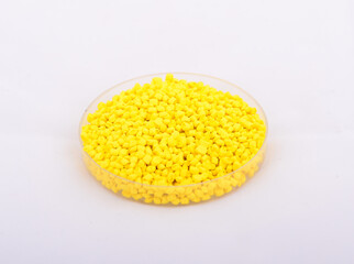Yellow color plastic material to manufacture paint, masterbatch.
