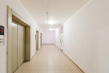 Russia, Moscow- April 17, 2020: interior public place, house entrance. doors, walls, staircase corridors
