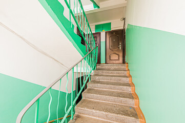 Russia, Moscow- April 17, 2020: interior public place, house entrance. doors, walls, staircase...