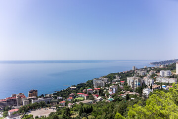Fototapeta na wymiar Crimea. Yalta. Beautiful palaces, green parks and cozy city streets.