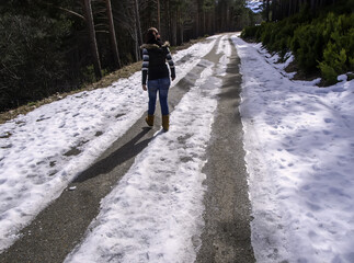 Woman walking in snow