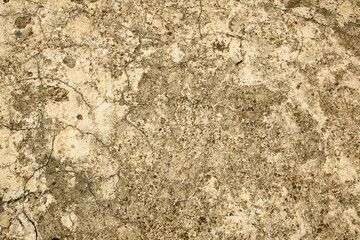 Background - stone texture, yellow old wall. Close-up.