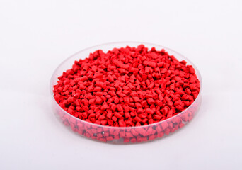 Red plastic material to manufacture paint, masterbatch.