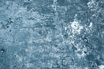 Small cracks in the concrete, close-up. Background for the designer