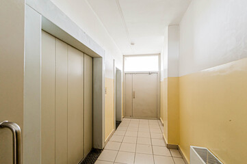 Russia, Moscow- April 17, 2020: interior public place, house entrance. doors, walls, staircase corridors