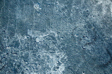 Blue old wall-background. Cracks on the wall, close-up. Background for the designer