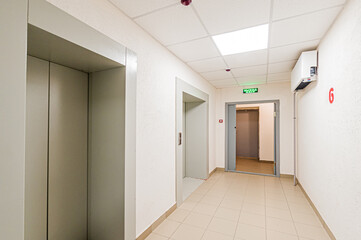 Russia, Moscow- April 17, 2020: interior public place, house entrance. doors, walls, staircase corridors