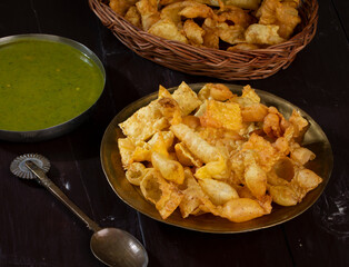 Indian Breakfast Dish Sola Fali or Masala Papri Served With Green Chutney