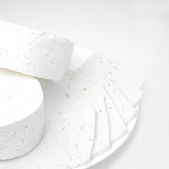 Cheese on a white dish.