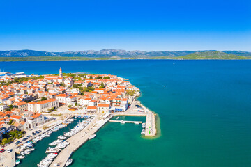 Fototapeta na wymiar Town of Betina on the island of Murter on Adriatic coast in Croatia, beautiful seascape from air