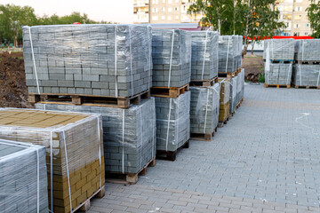 bricks on pallets on the street for pavement repair
