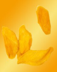 Dried mango isolated on yellow background.