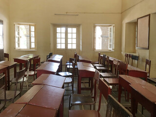Empty old style classroom of a primary school from India.
