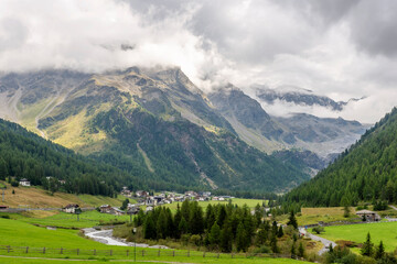 Fototapeta na wymiar Panoramic view of Solda, South Tyrol, Italy, under a dramatic sky