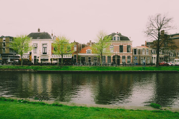 Fototapeta na wymiar Water canal in Leiden, Netherlands. Photographed in April 2017