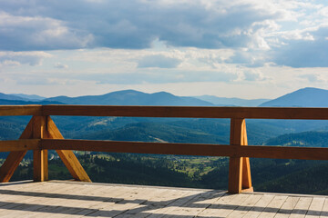 Beautiful view of the mountain range on the observation deck in the mountains of the Carpathians of Ukraine.