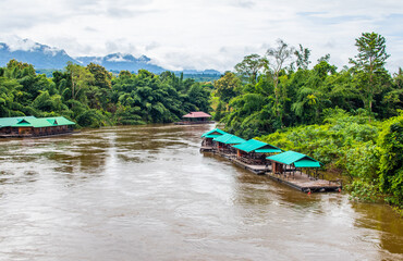 In Thailand in Kanchanaburi Province, there are many houseboats on the famous Kwai River