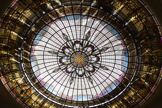 Rounded stained glass ceiling in old historical building. Glass stained ceiling with beautiful ornate patterns and geometric shapes. Mendoza, Argentina - Powered by Adobe