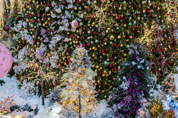 Christmas installations and decorations with garlands, trees, pine needles and illumination. 05 December 2020, Minsk, Belarus