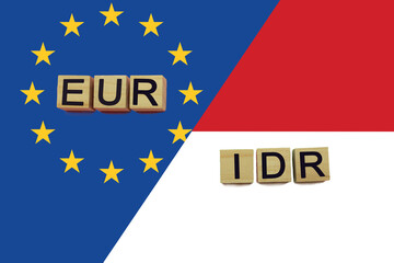 United Europe and Indonesia currencies codes on national flags background