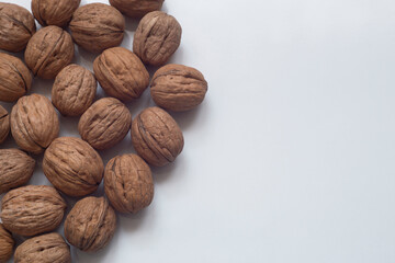 Images of walnuts on an insulated table. 