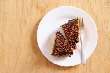 Top view of carrot cake with chocolate. Traditional Brazilian Carrot Cake.
