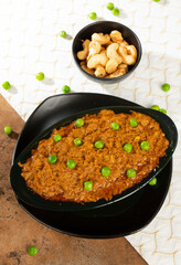 Rajasthani Famous Traditional Cuisine Haldi Sabji or Tukkar Served with Salad 
