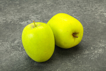 Two ripe green sweet apples
