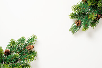 Fototapeta na wymiar Christmas composition. Fir tree branches on white background. Christmas, winter, new year concept. Flat lay, top view, copy space