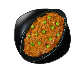 Rajasthani Famous Traditional Cuisine Haldi Sabji or Tukkar Served with Salad on White Background