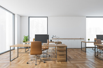 Office room with leather chairs and computers on table, white and wooden room