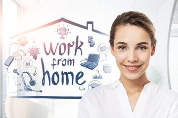 Smiling young woman working from home